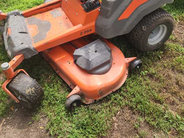 Working Riding Lawn Mower