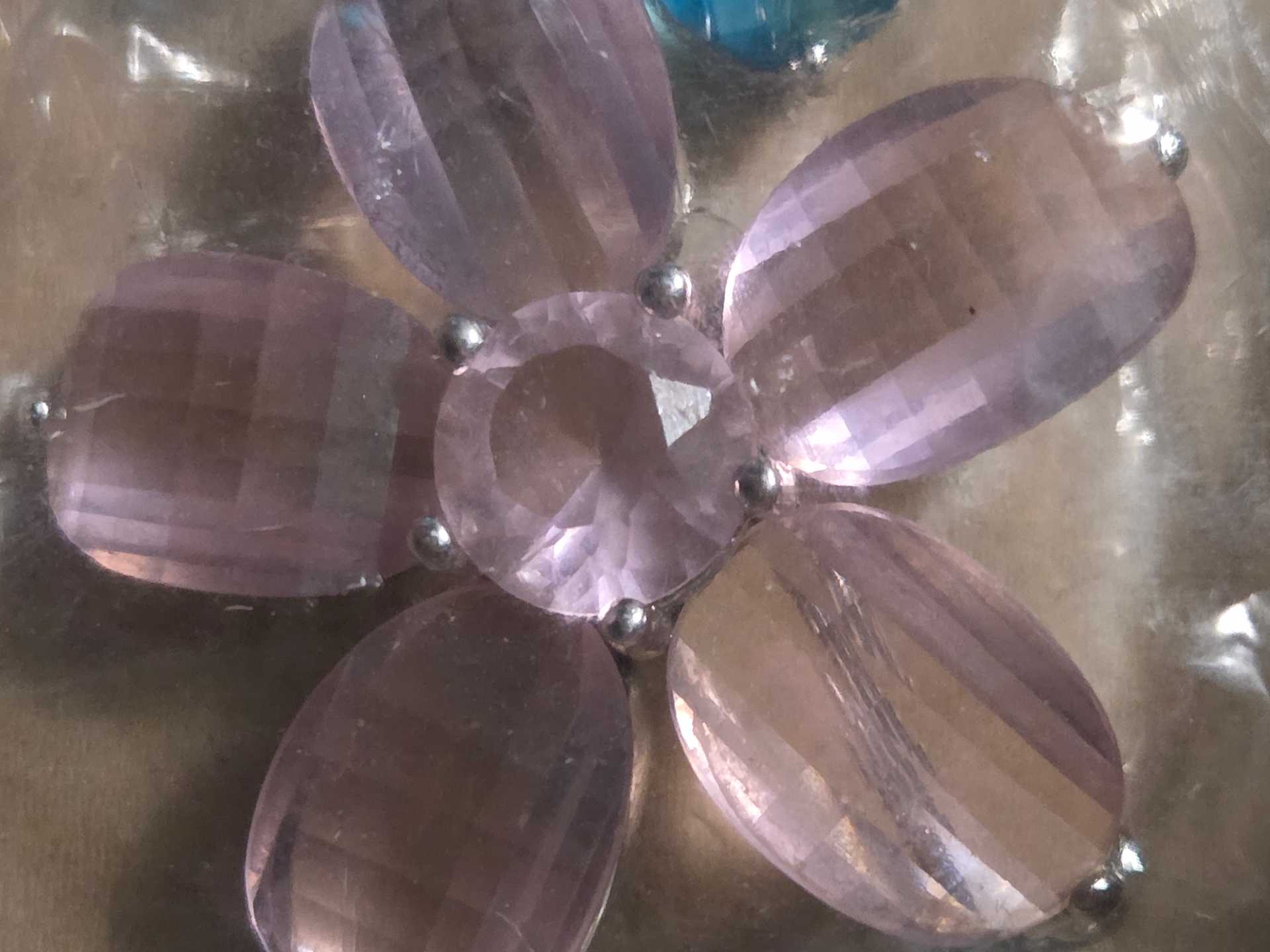 Sparkling Lavender Gemstone Flower Brooch with Blue Accents